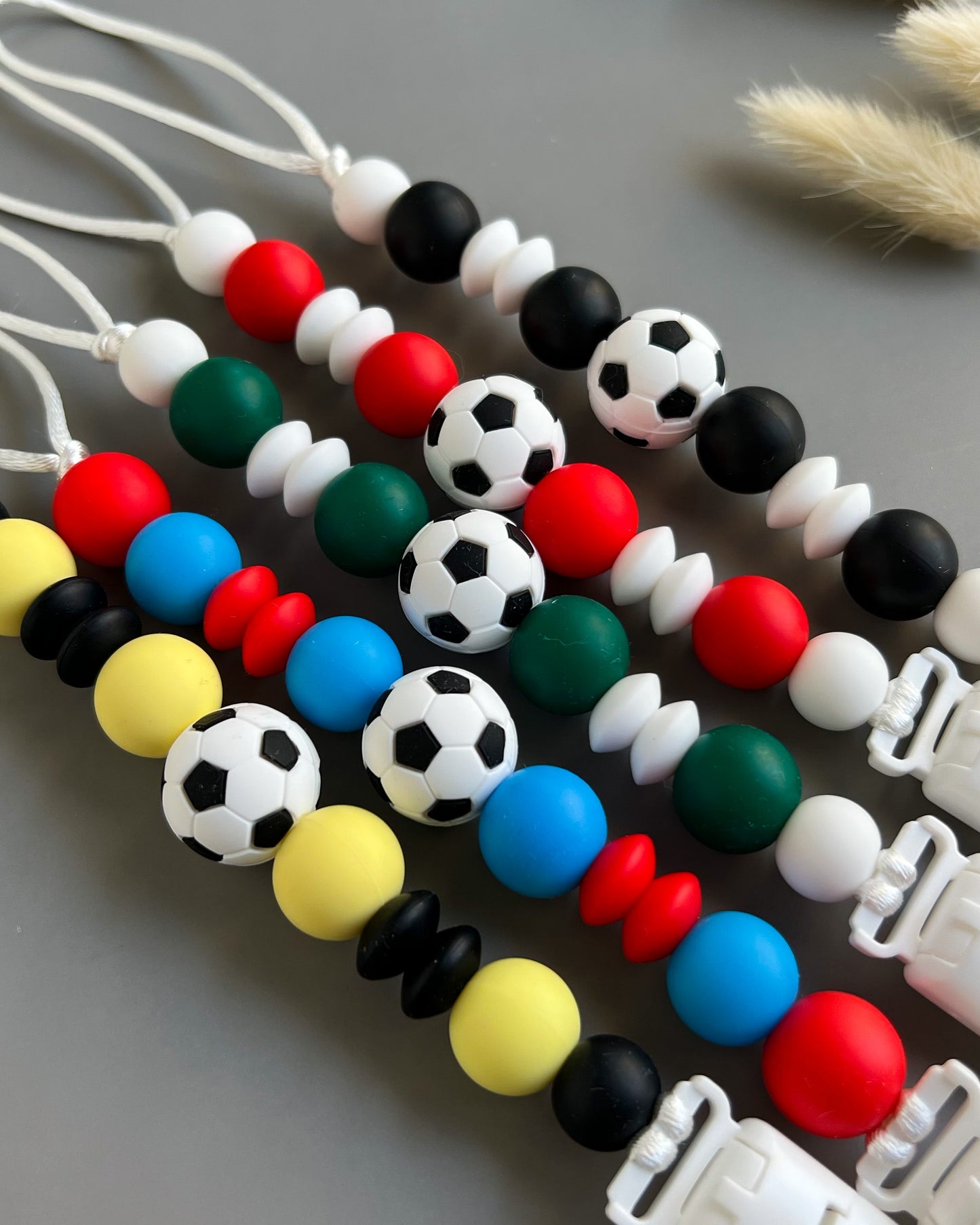 FOOTBALL PACIFIER CLIPS