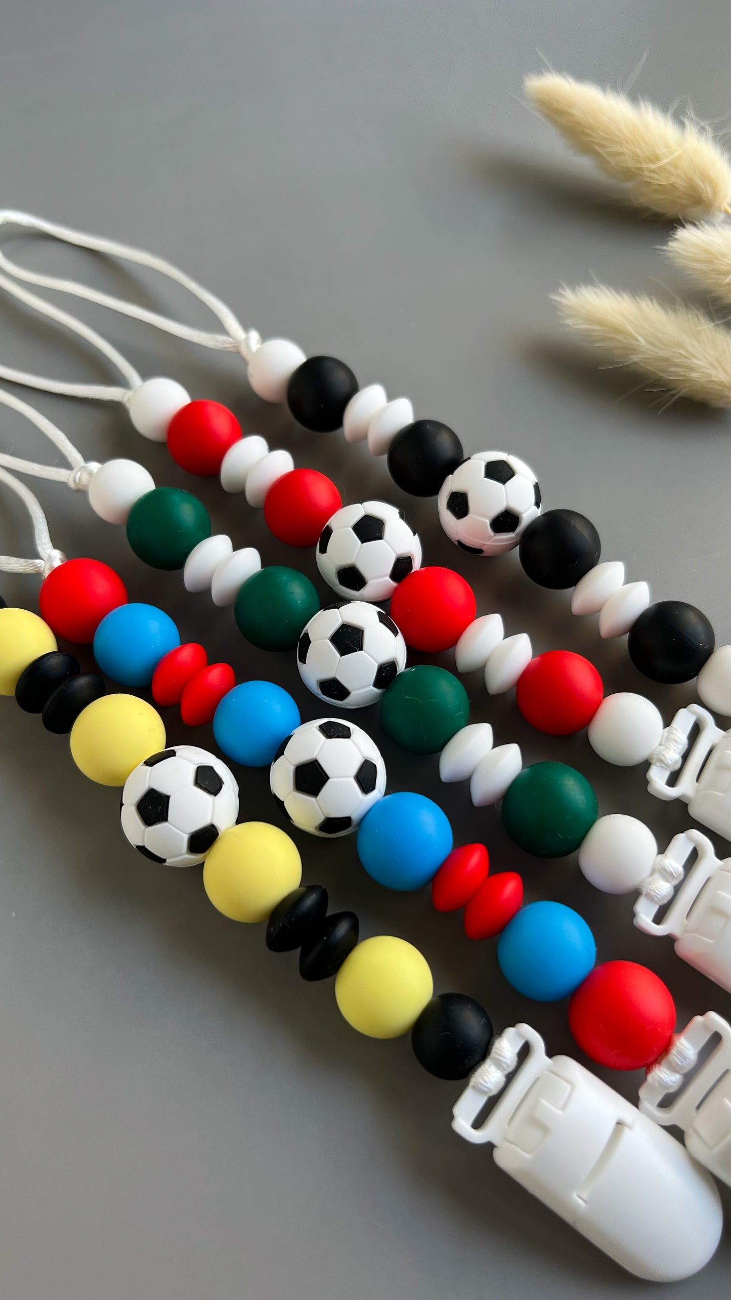 FOOTBALL PACIFIER CLIPS