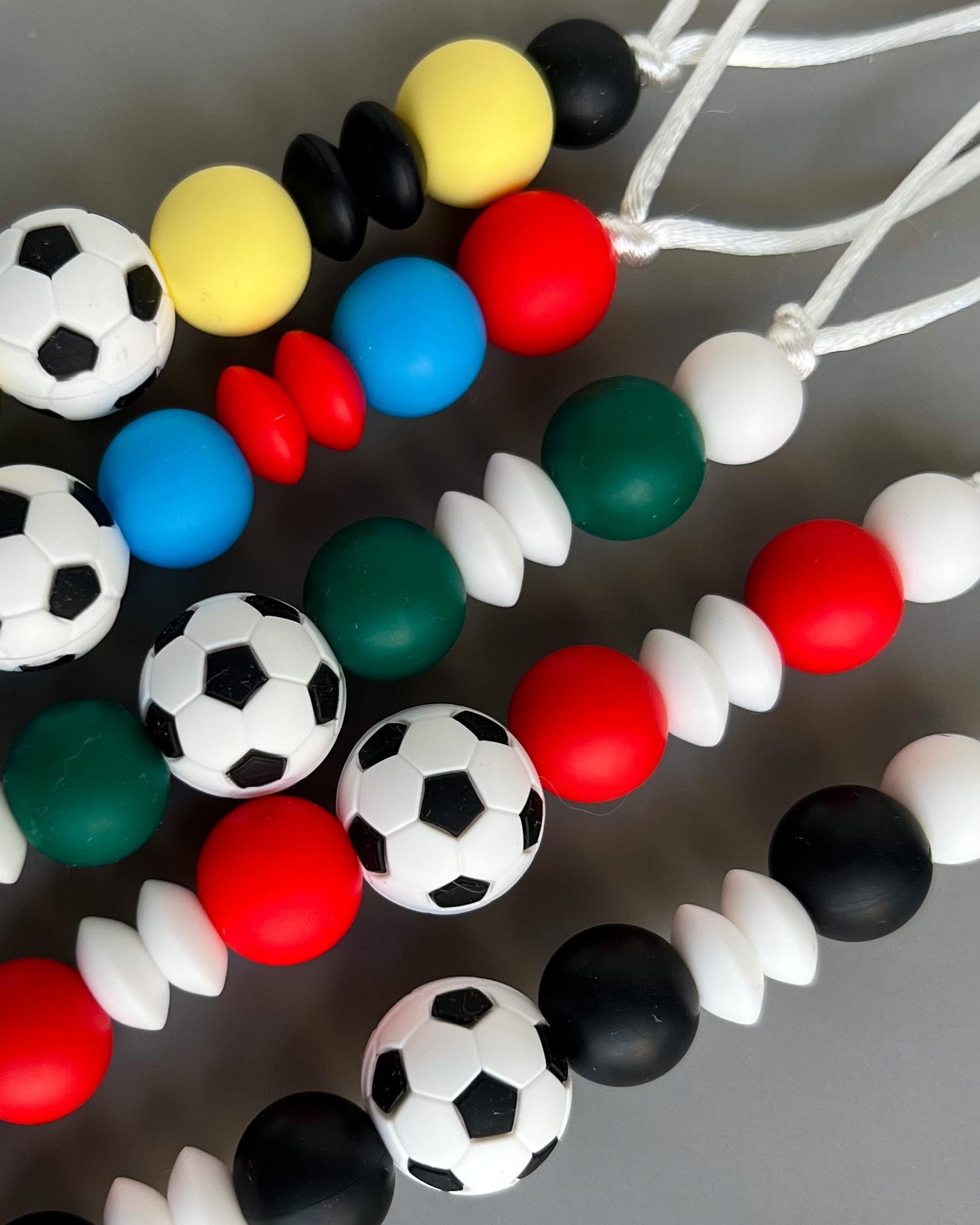 FOOTBALL PACIFIER CLIPS